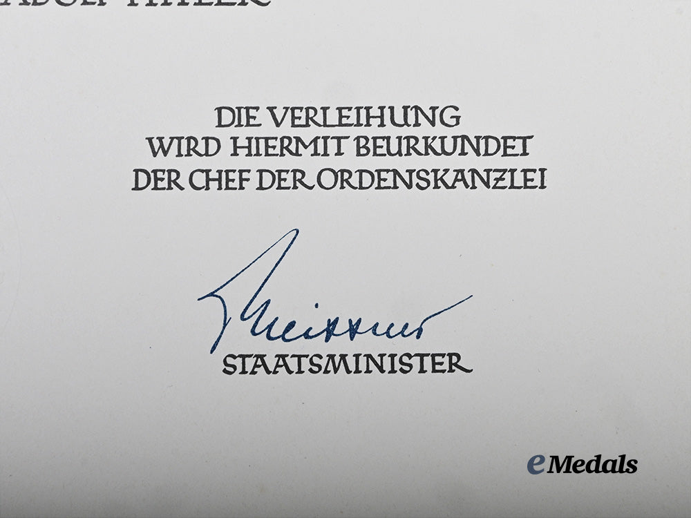 germany,_third_reich._an_award_document_for_a_german_eagle_order,_merit_medal_with_swords,_to_sargento_ramon_linde_delgado_e_medals__g62735_5