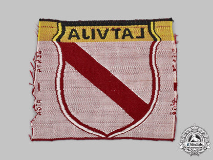 germany,_wehrmacht._a_latvian_volunteer’s_sleeve_shield,_by_lenta_47_m21_mnc1011