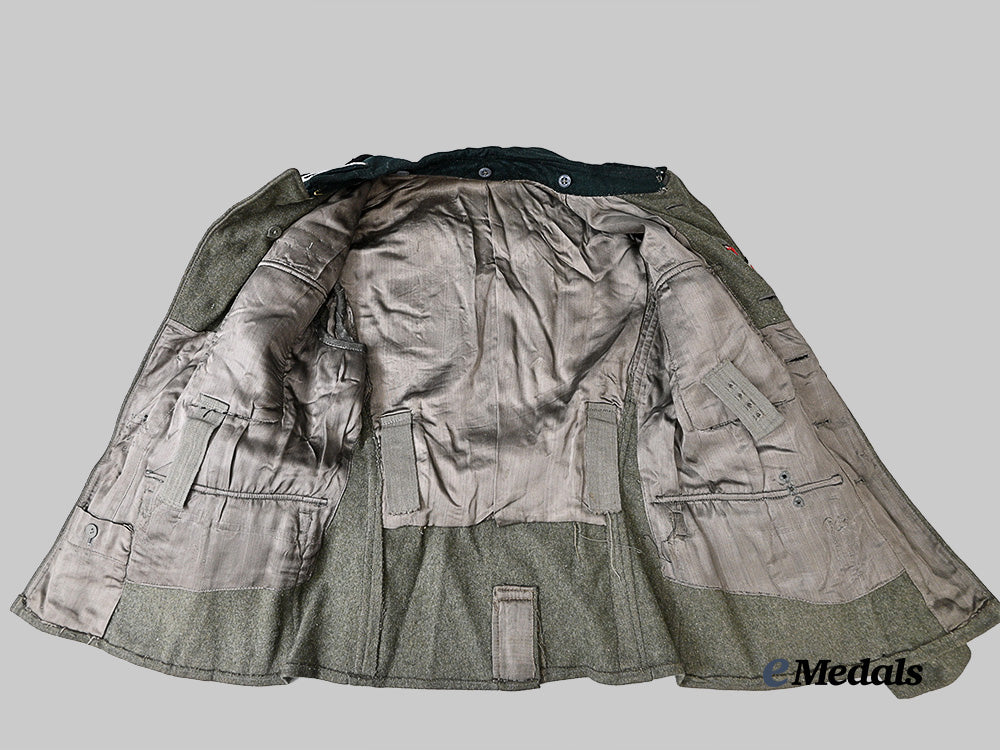 germany,_heer._a_rare_großdeutschland_division_service_tunic_for_a_leutnant_of_engineers,_late-_war_example_e_medals__g62717_18