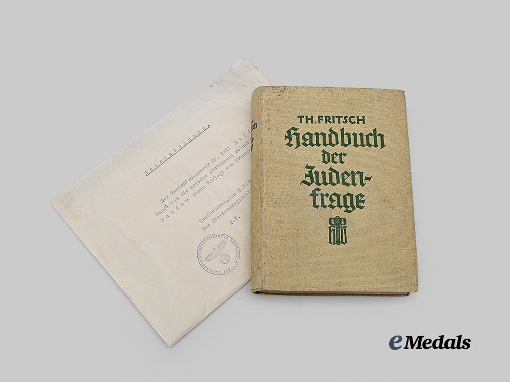 germany,_third_reich._a1936_edition_of_handbuch_der_judenfrage,_with_ancestry_affirmation_e_medals__m0320-15_2