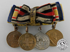 A German Imperial Non Combatant Red Cross Miniature Group
