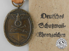 A West Wall Medal With Packet