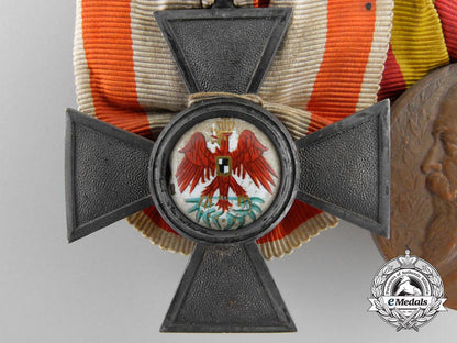 a_german_imperial_red_eagle_medal_bar_by_neuhaus&_son,_berlin_a_2231