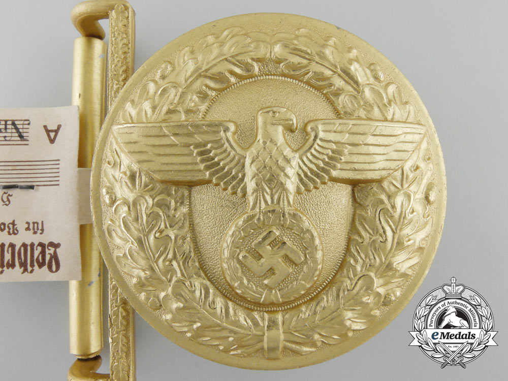 a_political_leader's_belt_buckle_by_f.w._assmann;_rzm_control_tag&_published_a_2734