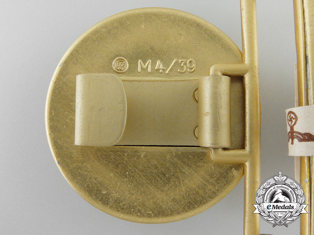 a_political_leader's_belt_buckle_by_f.w._assmann;_rzm_control_tag&_published_a_2735