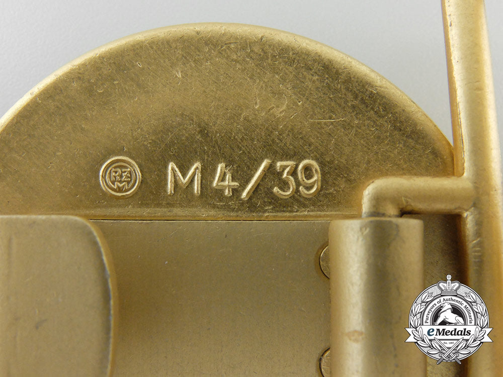 a_political_leader's_belt_buckle_by_f.w._assmann;_rzm_control_tag&_published_a_2737