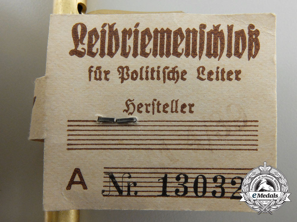 a_political_leader's_belt_buckle_by_f.w._assmann;_rzm_control_tag&_published_a_2738