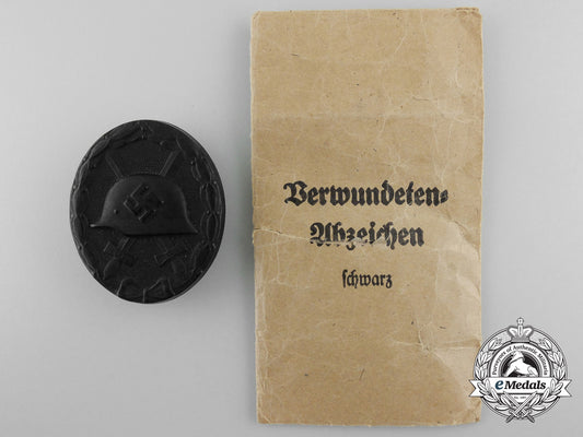 a_mint_black_grade_wound_badge_with_packet_of_issue_a_3460