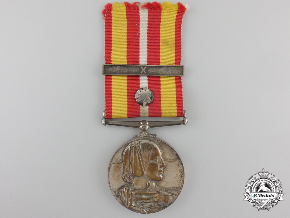 a_voluntary_medical_services_medal_with_rosette&_bar_a_387