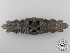 A Mint Bronze Grade Close Combat Clasp By A.g.m.u.k.