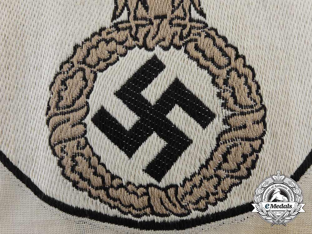 a_scarce_nskk(_german_national_socialist_motor_corps)_sport_shirt_insignia_a_4096