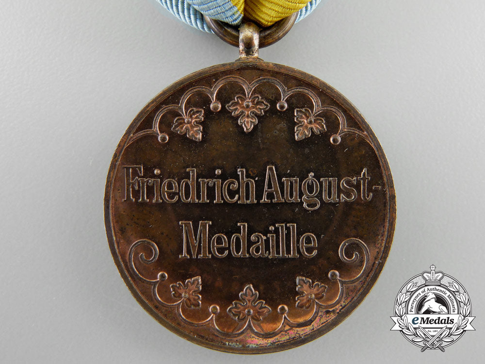 a_mint_saxon_friedrich_august_medal;_bronze_grade_with_packet_a_4189