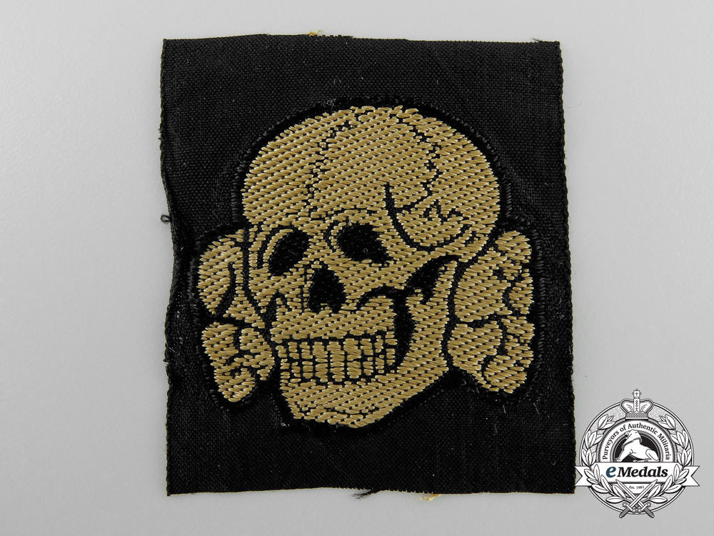 germany,_waffen-_ss._a_tropical_totenkopf_cap_insignia_a_4861