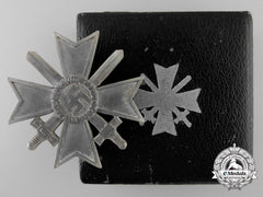 A War Merit Cross First Class With Swords By C.e. Juncker