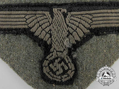 an_ss_em/_nco's_sleeve_eagle_with_piece_of_tunic_a_4881