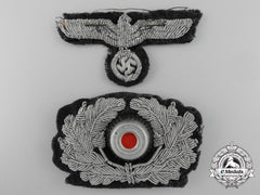 A Set Of Army Officer Visor Wreath & Eagle Insignia