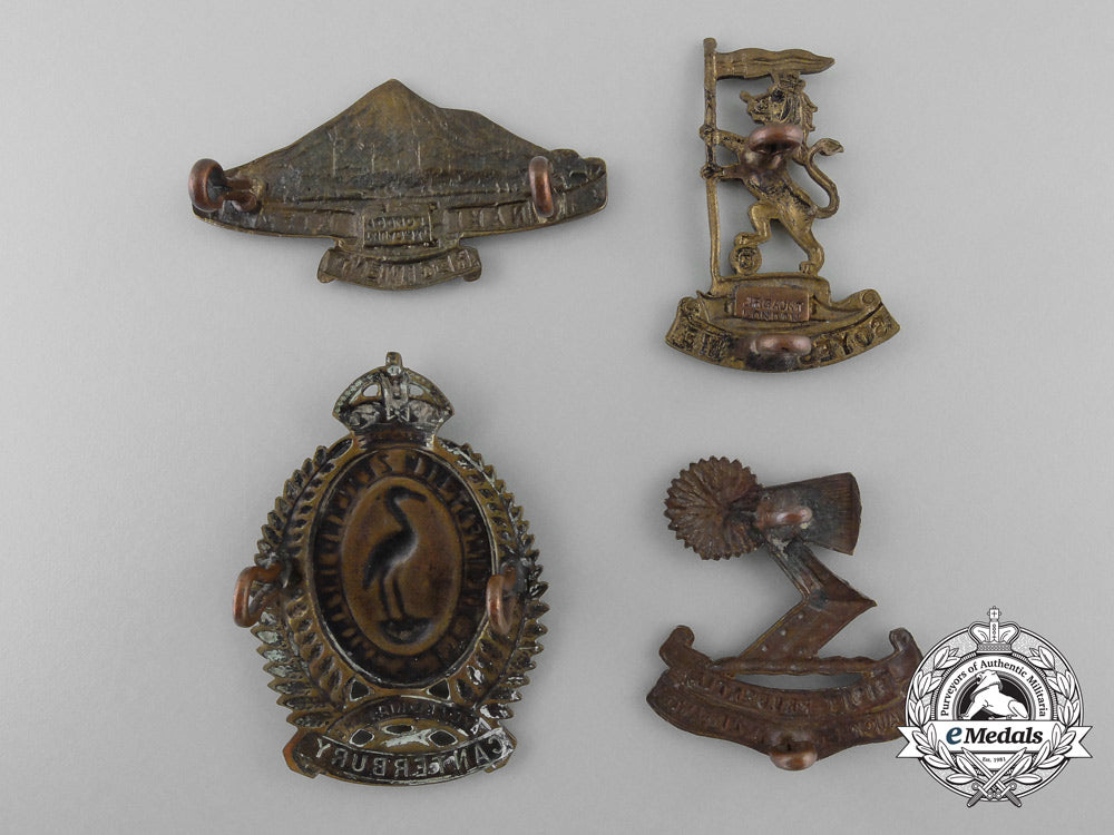 four_first_war_new_zealand_cap_badges_a_5278