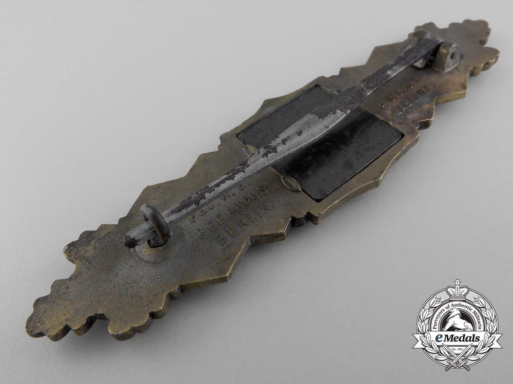 a_bronze_grade_close_combat_clasp_by_a.g.m.u.k._a_6574
