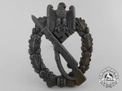An Infantry Badge Bronze Grade;  Marked “8”