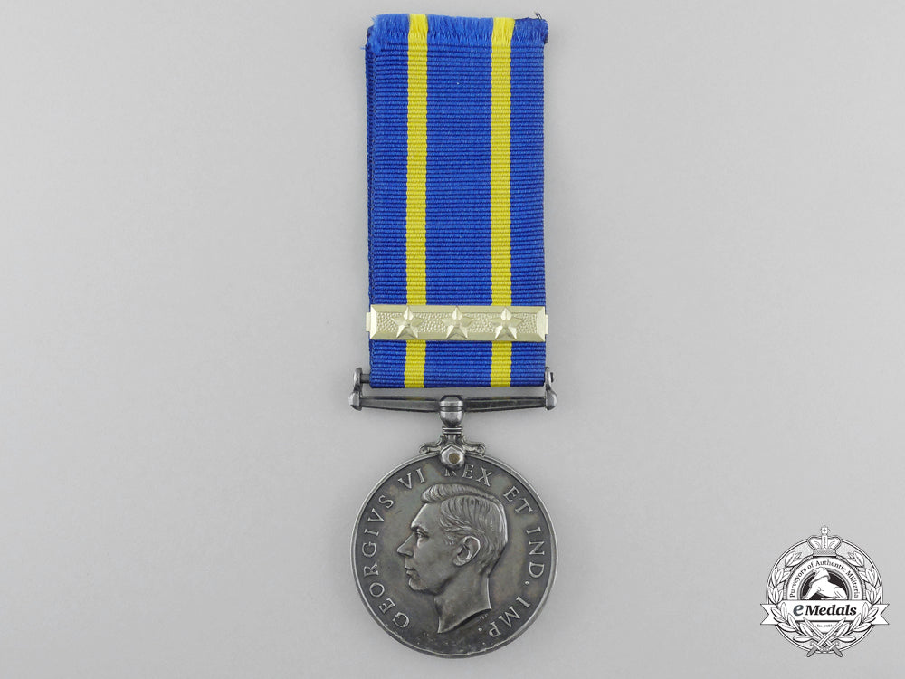 a_royal_canadian_mounted_police_long_service_medal_with_three_star_clasp_a_697