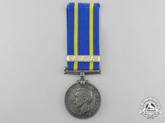 A Royal Canadian Mounted Police Long Service Medal With Three Star Clasp