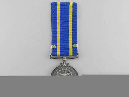 a_royal_canadian_mounted_police_long_service_medal_with_three_star_clasp_a_700