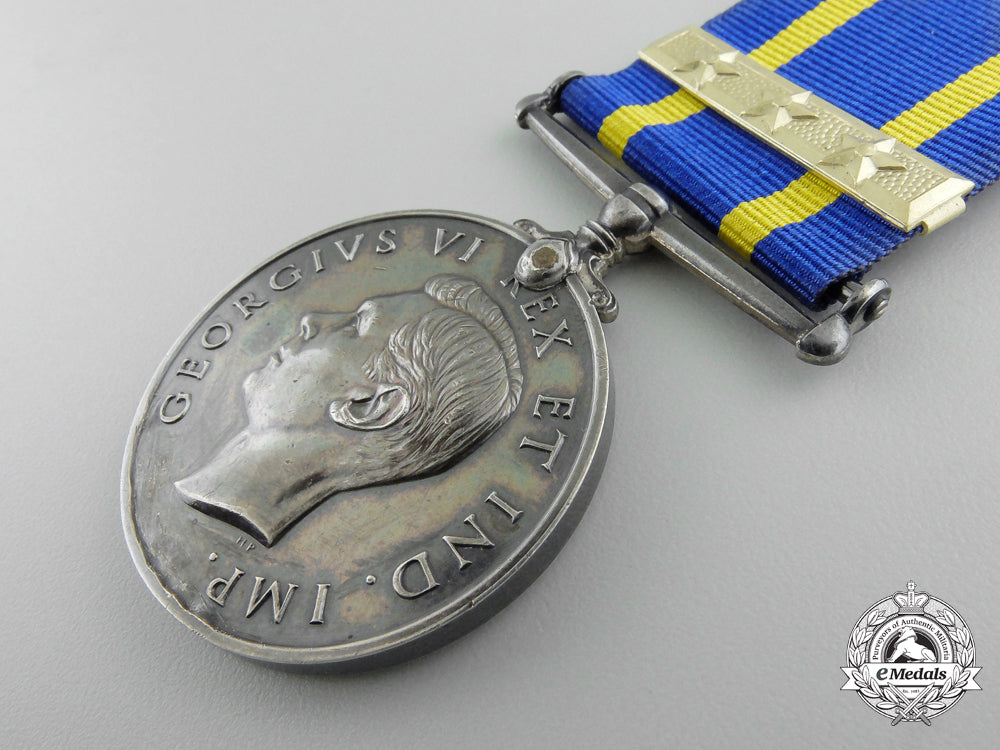 a_royal_canadian_mounted_police_long_service_medal_with_three_star_clasp_a_701