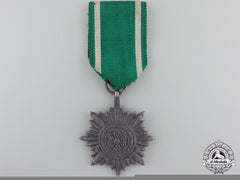 An Ostvolk Merit Badge 2Nd Class Silver Grade