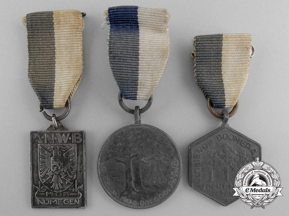 three_second_world_war_era_royal_dutch_touring_club_travellers'_association_medals_a_7914