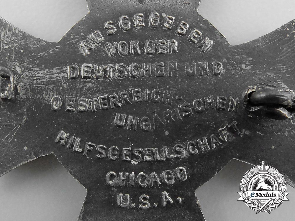 three_german_imperial_iron_cross_badges_a_8064
