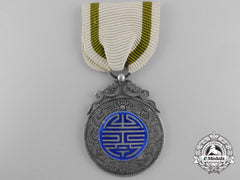 China, Qing Dynasty. A Crown Prince Royal Birth Blessing Medal, C.1840