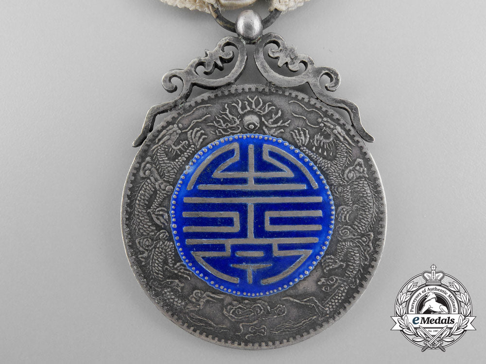 china,_qing_dynasty._a_crown_prince_royal_birth_blessing_medal,_c.1840_a_8081_1