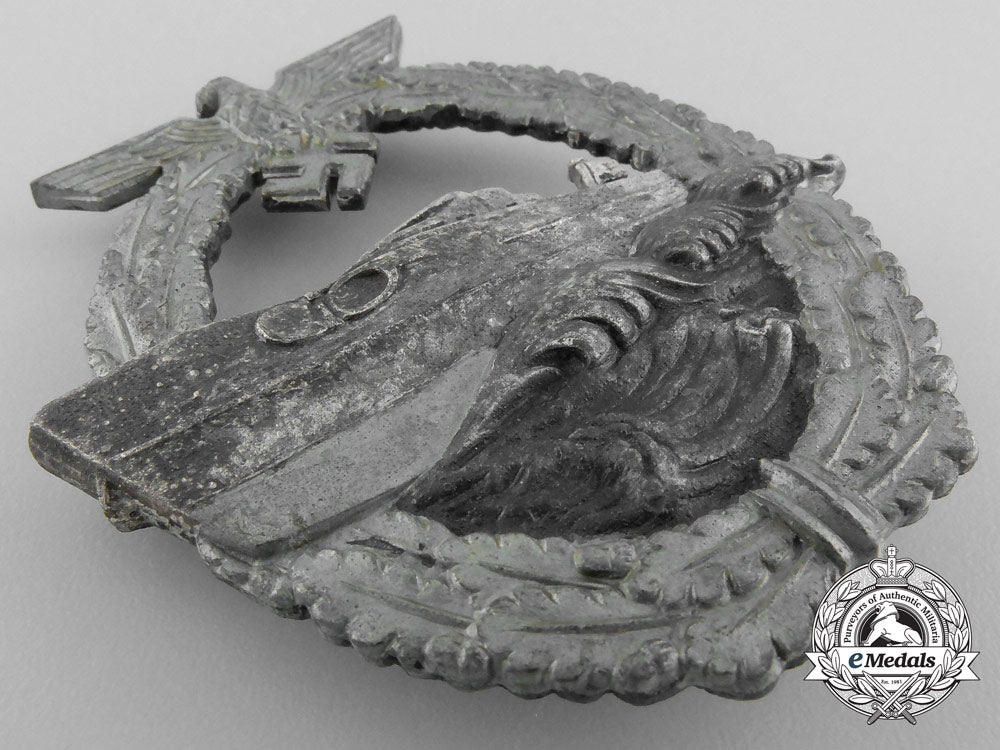 a_kreigsmarine_e-_boat_badge_by_schwerin,_berlin;_second_version_a_8253