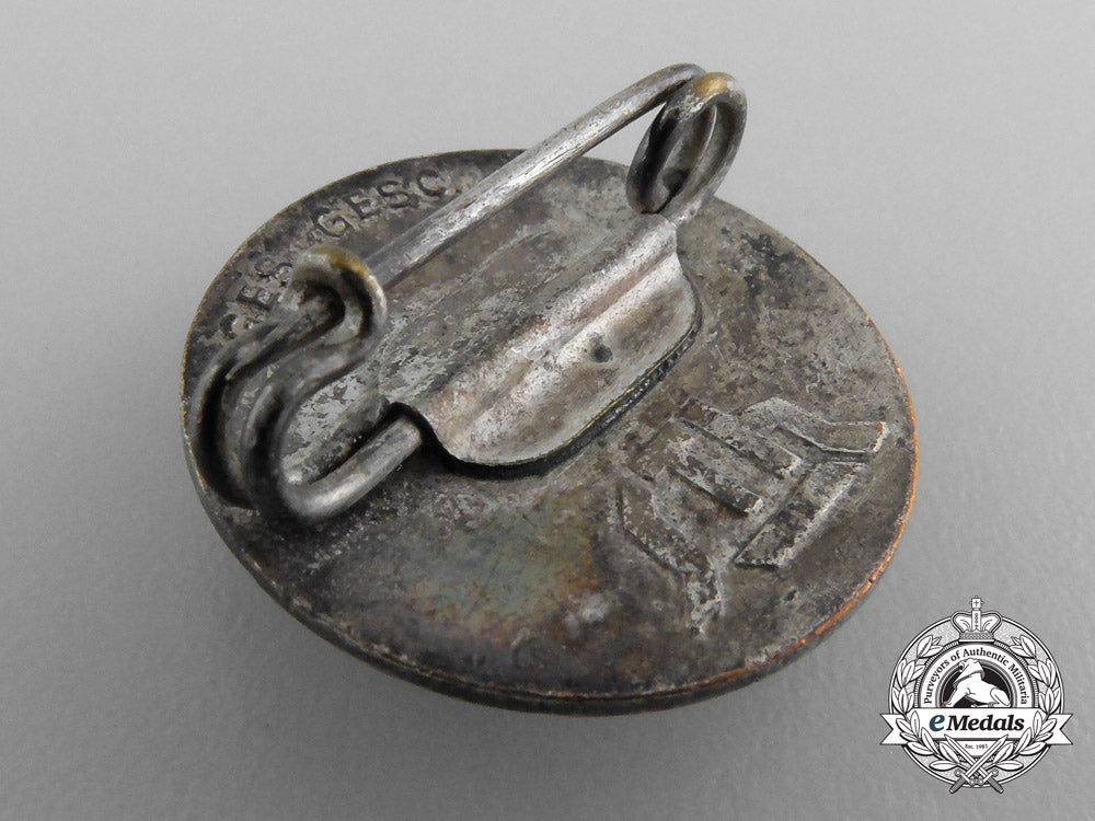 two_german_stehlhelm_veteran_badges_a_9374