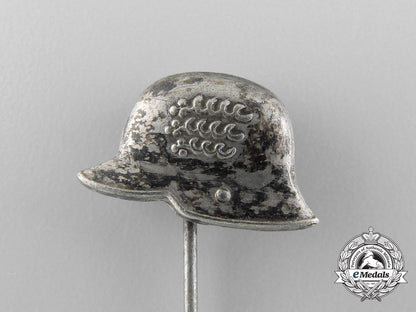 two_german_stehlhelm_veteran_badges_a_9376