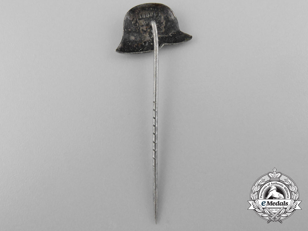 two_german_stehlhelm_veteran_badges_a_9377