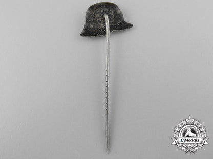 two_german_stehlhelm_veteran_badges_a_9377