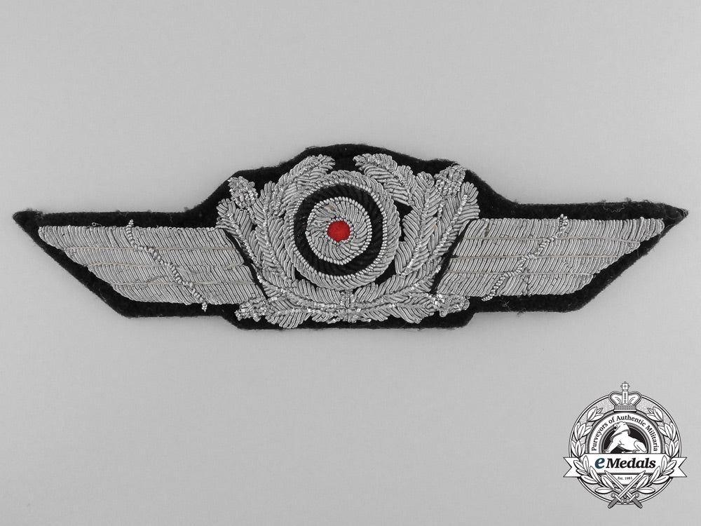 a_generalluftzeugmeister(_civilian_technician's)_officers's_visor_cap_insignia_a_9396