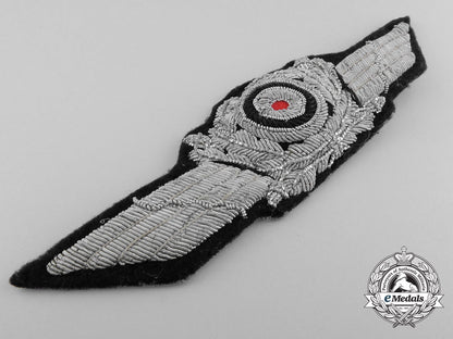 a_generalluftzeugmeister(_civilian_technician's)_officers's_visor_cap_insignia_a_9398