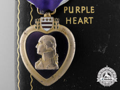 A Vietnam Period American Purple Heart; Numbered With Case