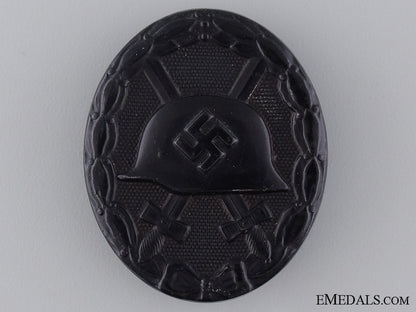 a_black_grade_second_war_wound_badge;_marked_a_black_grade_se_53c7dcc43075a