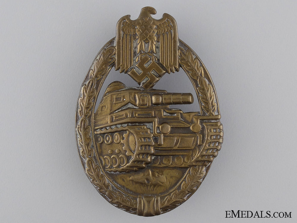 an_early_bronze_grade_tank_badge;_unmarked_a_bronze_grade_t_53baca472d366