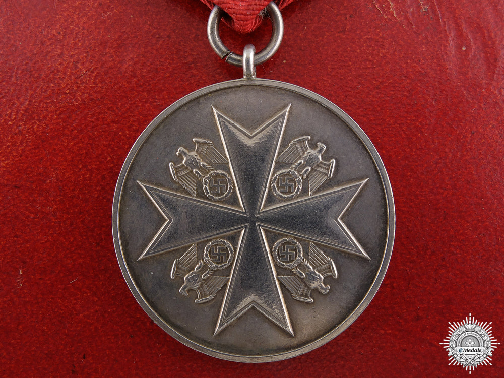 a_cased_german_eagle_order_merit_medal_a_cased_german_e_54fdc3a3e2daf
