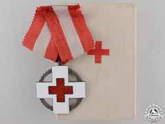 A Danish Red Cross Decoration With Case