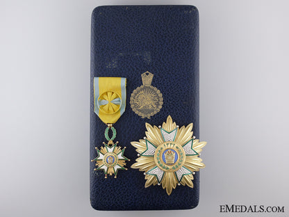 a_french_made_order_of_the_crown_of_iran;_officer's_set_a_french_made_or_53d6b7eb1ee48
