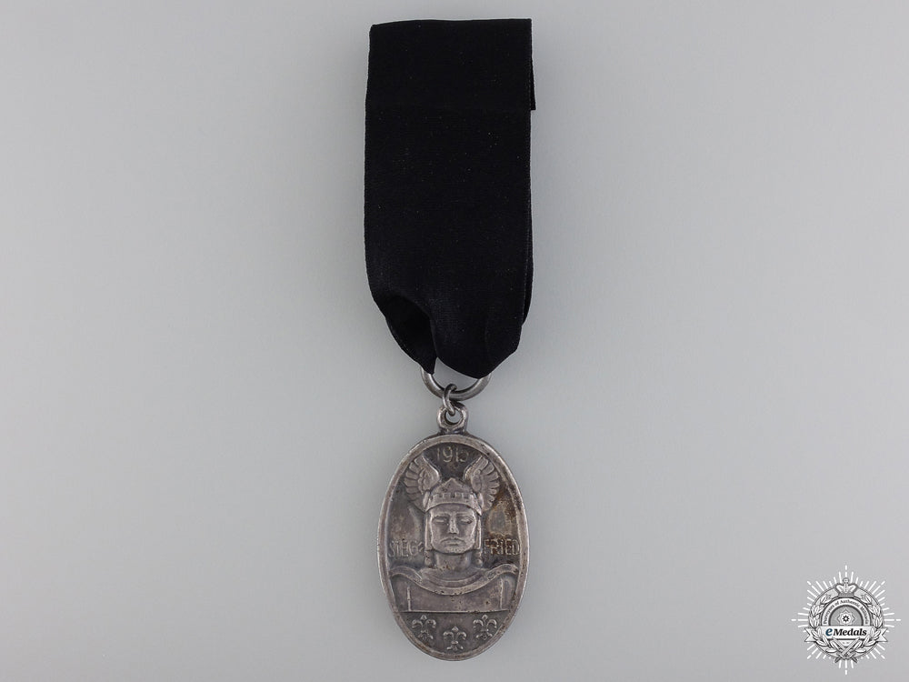 a_german1915_care_for_widows_and_orphans_medal_a_german_1915_ca_54bfcc3ca65a0