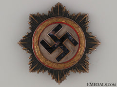 A German Cross In Gold By C.e. Juncker