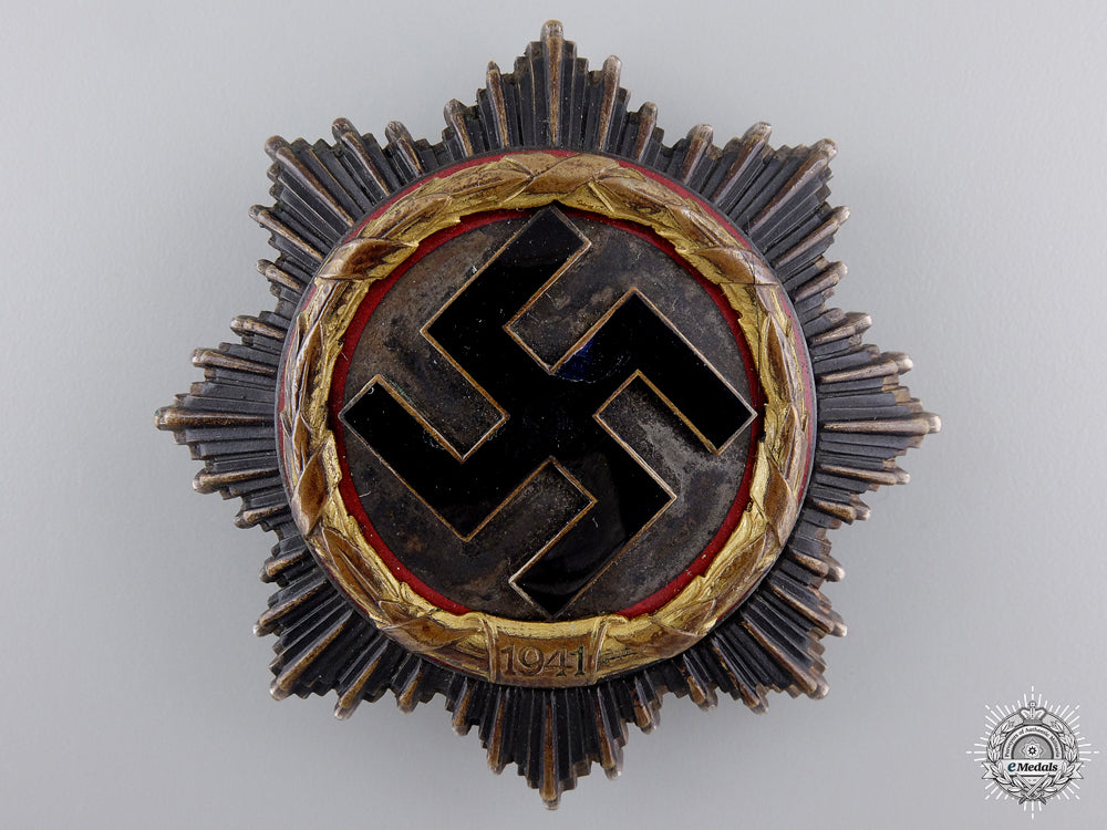 a_german_cross_in_gold_by_deschler&_sohn_to_stuka_pilot_karl-_hermann_lion_a_german_cross_i_54df85d9ac147