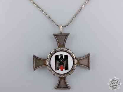 a_german_red_cross_sister's_cross;_silver_grade_with_wreath_a_german_red_cro_54ff19ab93c5f