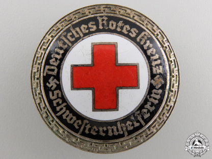 a_german_red_cross_nurse's_senior_helper_service_brooch_a_german_red_cro_55635e1c46358